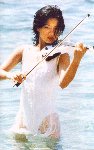 [Vanessa playing her electric violin in the sea, very sexy]